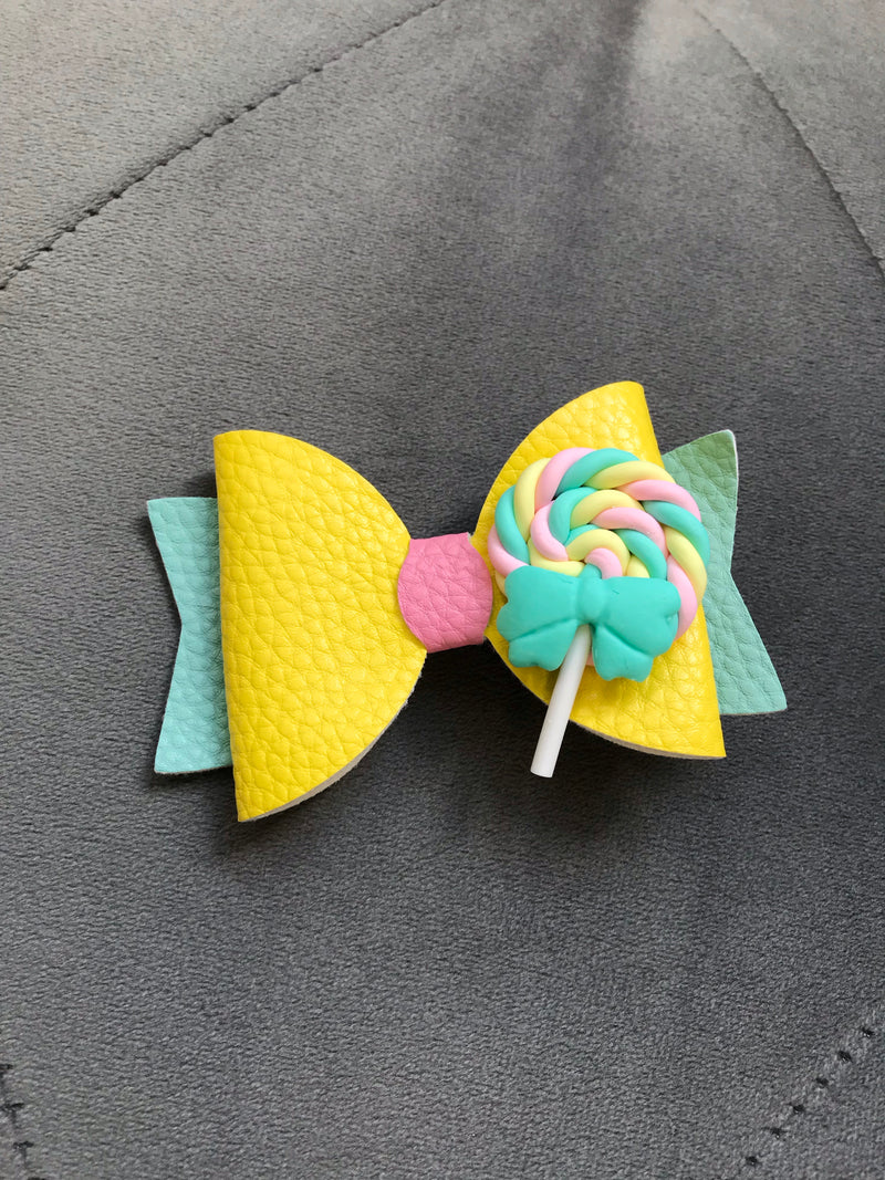 Small Bow Yellow Lollipop